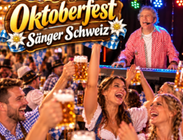Oktoberfest Sänger in der Schweiz bei einer ausgelassenen Feier mit tanzenden Gästen