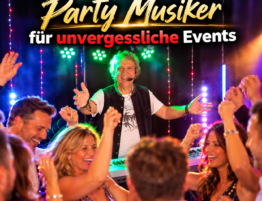 Partymusiker bei einer ausgelassenen Feier mit tanzenden Gästen und farbenfroher Bühnenbeleuchtung